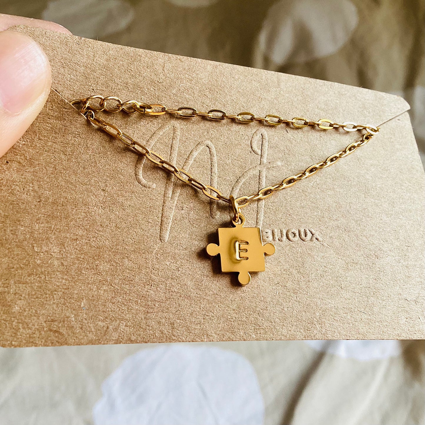 bracelet initiale pendentif puzzle doré