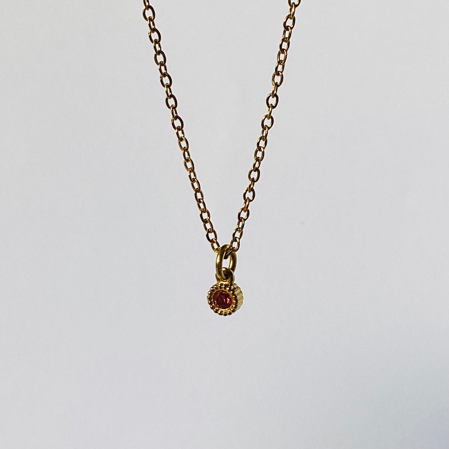 collier pendentif pierre rouge